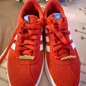 Adidas Red Sneakers with White and Gold Accents